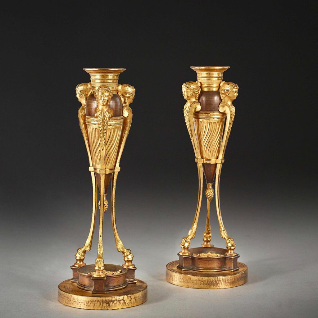 Pair of tripod etruscan candlestick